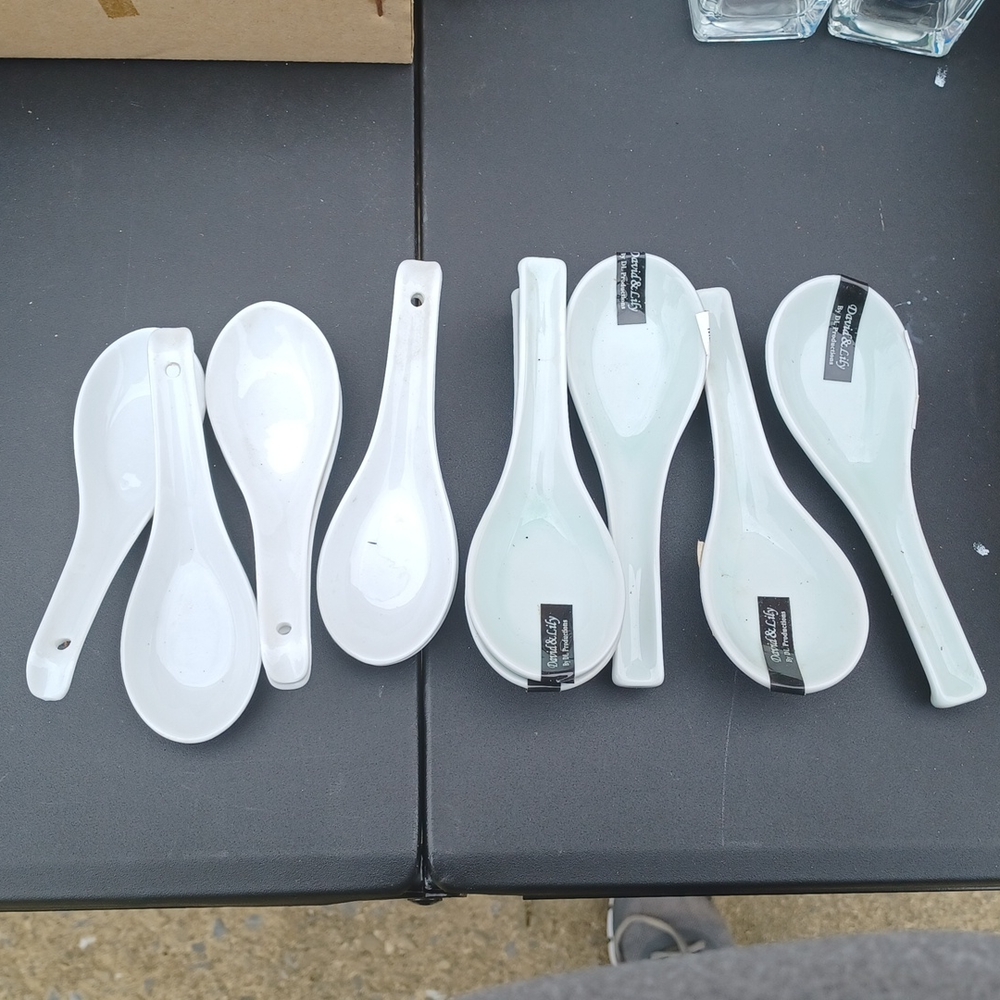 Set of 11 white David and lily white spoons